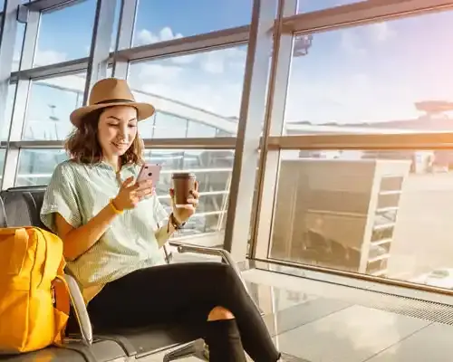 asian-girl-waiting-for-departure-at-the-airport-on-your
