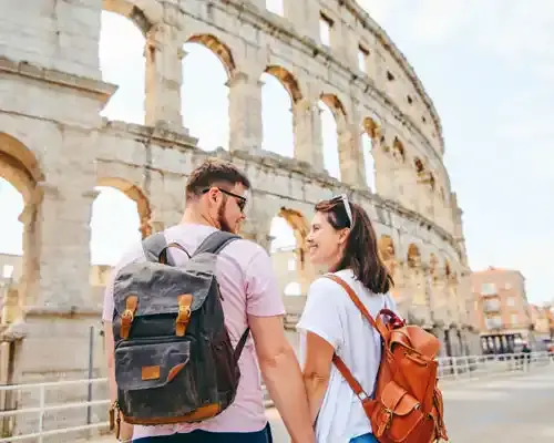 happy-beautiful-couple-in-front-of-coliseum-in-pula-croatia